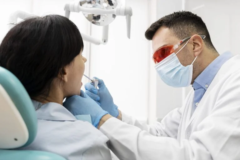 Dentist doing check up on patient